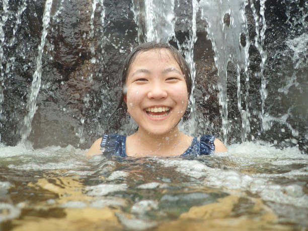istock Japanese girl enjoys having hot spring 1233479186