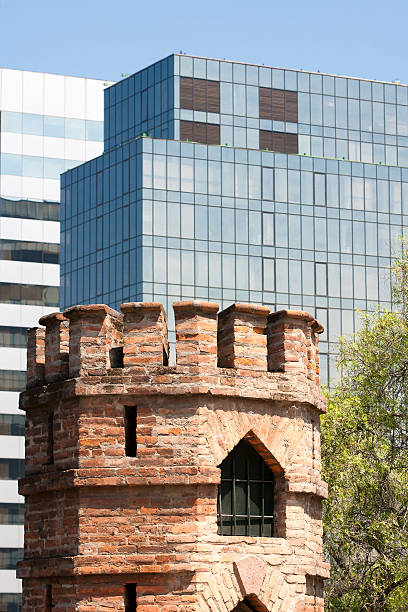 Contrast between vintage  building and modern skyscraper in Santiago, capital of Chile