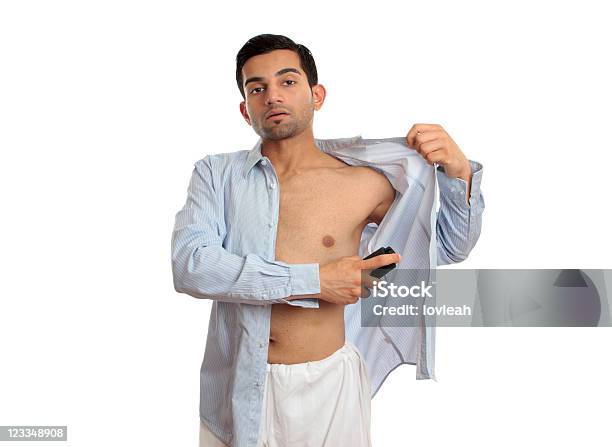 Man Spraying Deodorant Stock Photo - Download Image Now - Button Down Shirt, Deodorant, Men
