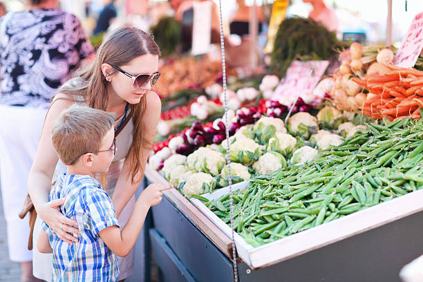 istock Mother and son at market 123352417