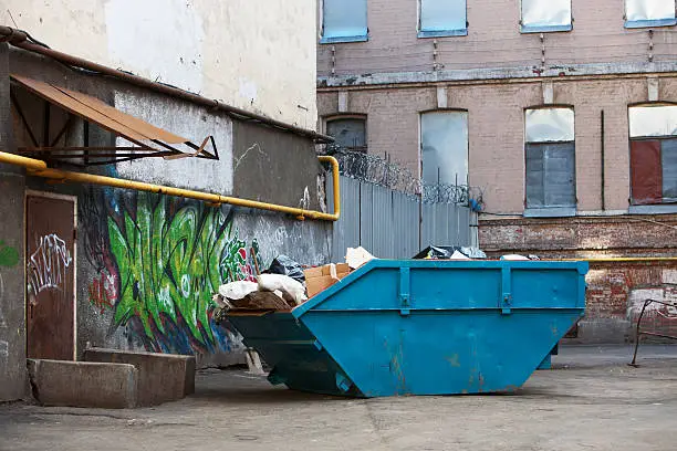 Photo of Blue Dumpster