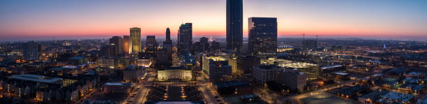 Aerial Panorama of Downtown Oklahoma City at Sunset Stitched aerial shot of Oklahoma City at sunset. oklahoma city stock pictures, royalty-free photos & images