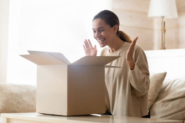 istock Happy female client satisfied with fast delivery service. 1233750984