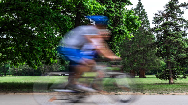 istock Silhouette of unknown men in a park during pandemic 1233754669