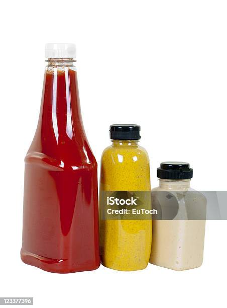 Ketchup Mustard And Horseradish In Bottles Angle View Stock Photo - Download Image Now