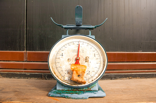 Old blue weighing scale