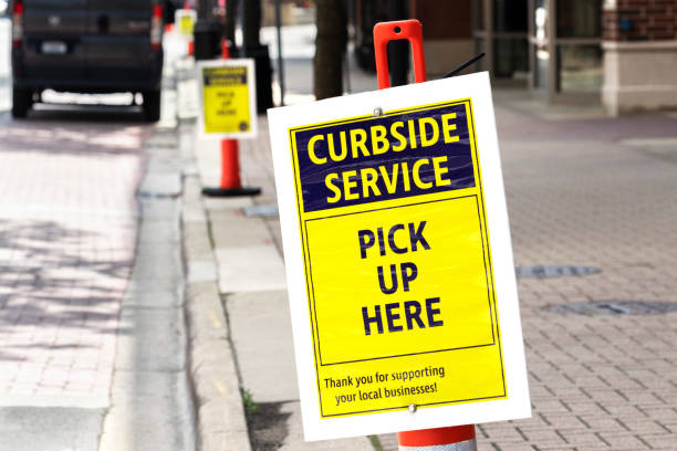 Curbside Service Sign Sign encouraging people to support local restaurants curb photos stock pictures, royalty-free photos & images
