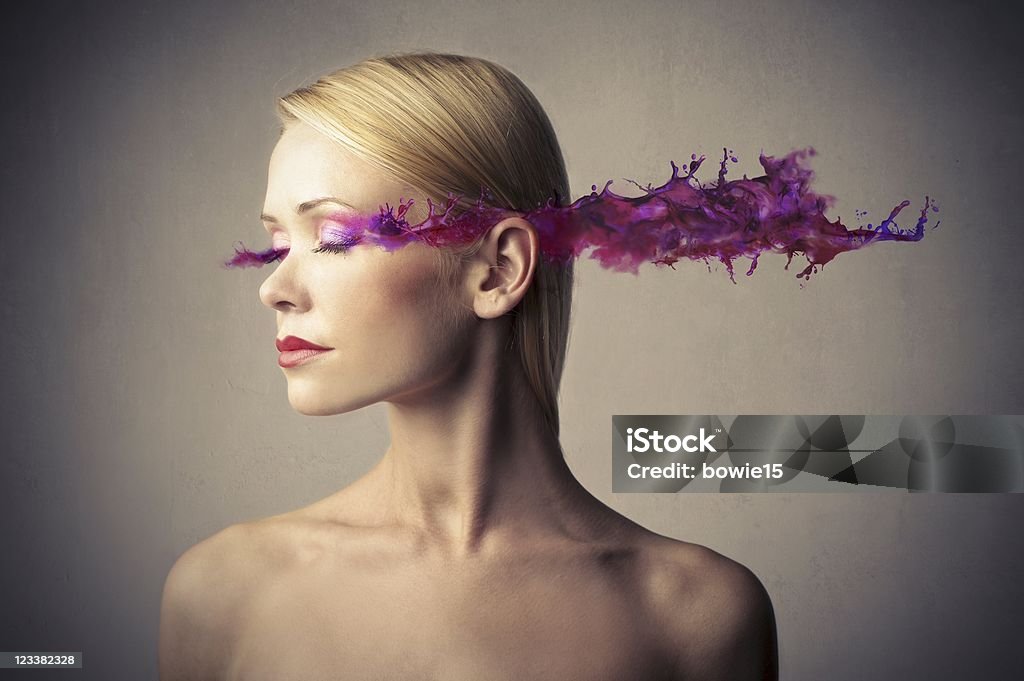 Make-up Beautiful woman with eyeshadow melting in purple paint Eyeshadow Stock Photo