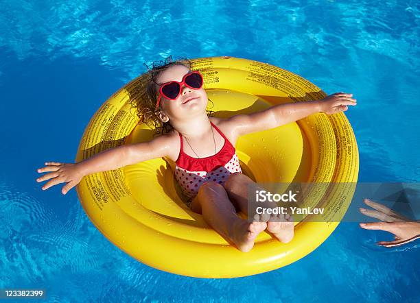 Little Girl Swims In Pool Stock Photo - Download Image Now - Swimming Pool, Child, Heat - Temperature