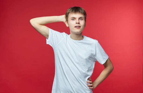 istock The young guy shows various emotions. Talented portrays the inner state and mood. Advertisement concept 1233989486