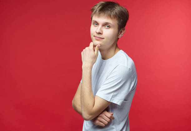 istock The young guy shows various emotions. Talented portrays the inner state and mood. Advertisement concept 1233989488