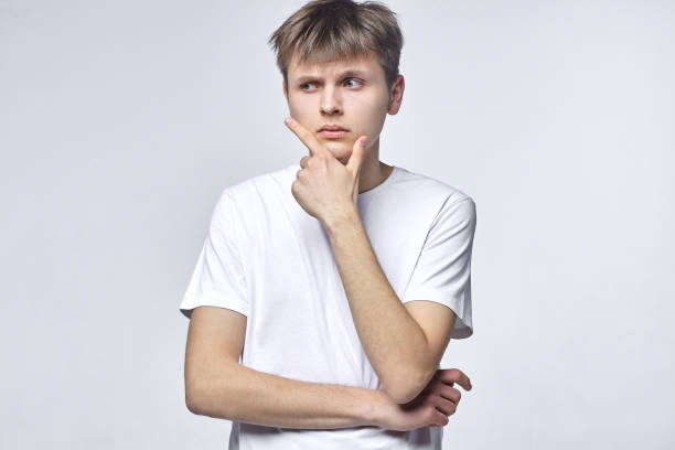 istock The young guy shows various emotions. Talented portrays the inner state and mood. Advertisement concept 1233989491