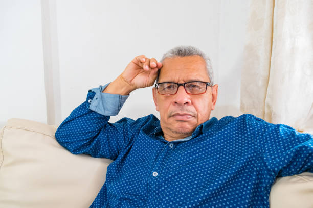Close-up of a smart older man with glasses