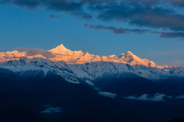istock Meili Snow mountain at sunrise 1234014138