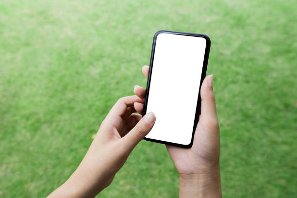 istock close-up women hand using smart phone white screen 1234052503