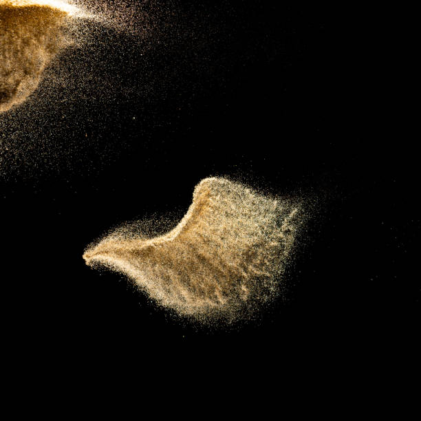 istock Dry river sand explosion.Brown color sand splash against black background. 1234074273