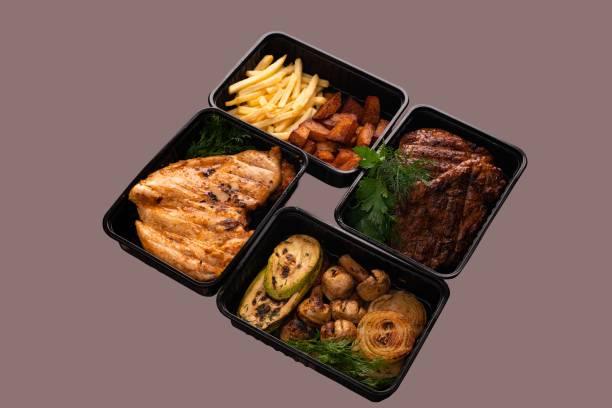 istock Fish steak with potatoes and vegetables shot 1234159158