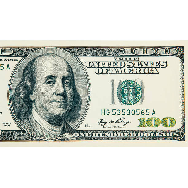 istock A hundred American dollars bill close-up on a white background isolated, clipped path. 1234169308