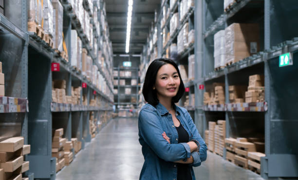 istock Business woman at warehouse for export and import concept 1234189837