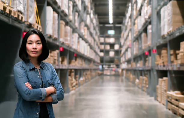 istock Business woman at warehouse for export and import concept 1234189866