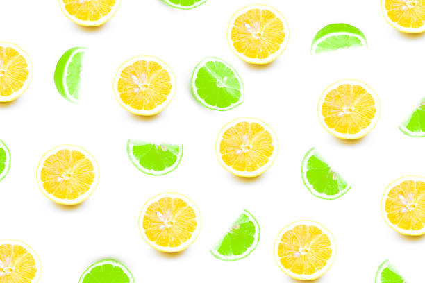 istock lemons refreshing Yellow and green on a white background 1234190616