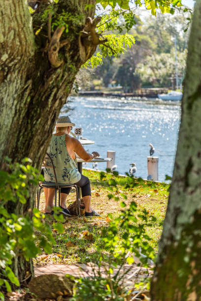 Estuary lifestyle living in the canals of South Yunderup South Yunderup, WA / Australia - 03/10/2019 Estuary lifestyle living in the canals of South Yunderup lake murray stock pictures, royalty-free photos & images