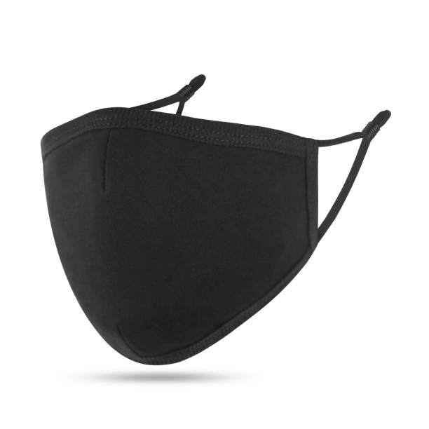 istock Blank black cotton reusable cloth mask isolated on white background. Front view. Empty surgical mask for mockup. Clear protective face mask for template & branding. 1234196285