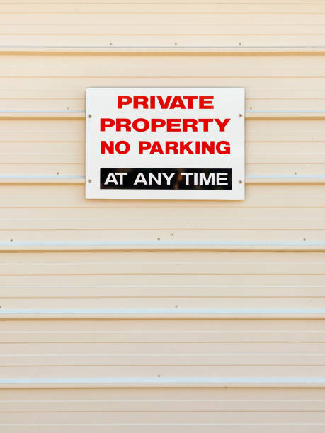 istock Private Property No Parking sign on garage door 1234254201