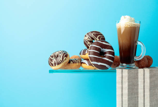 istock Chocolate donuts and Irish coffee on a blue background. 1234329761
