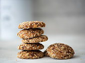 stack of oatmeal cookies with seeds and nuts
