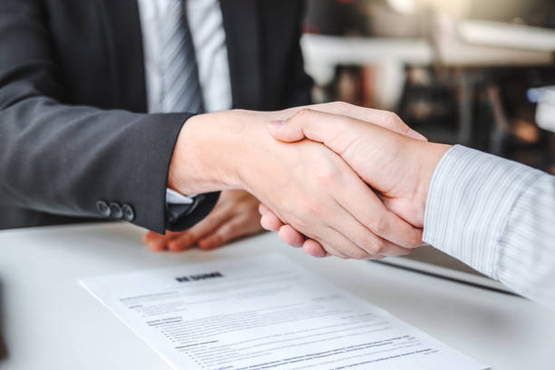 istock Business Shaking hands greeting new colleagues after during job interview Concept 1234441751