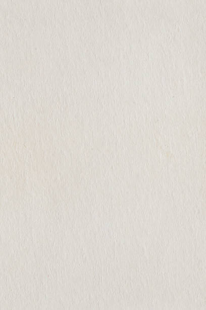 istock sheet of light beige blank paper - seamless repeatable texture 1234445875