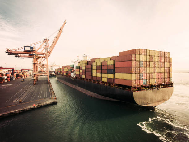 istock Container ship in export and import. International shipping cargo. 1234457811
