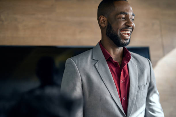 istock African manager laughing during a meeting with his staff 1234459598