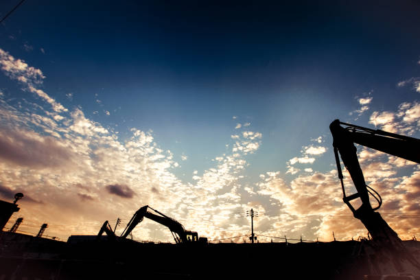 istock Of the shovel car silhouette and sunset 1234493686