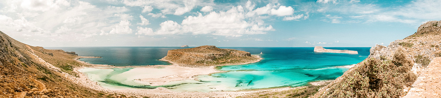 The paradise lagoon and beach of Balos on the Crete island in Greece. Seen during a hot day in the summer.