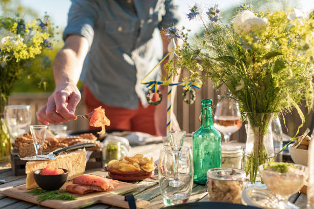 istock a man picks a piece of salmon 1234526832