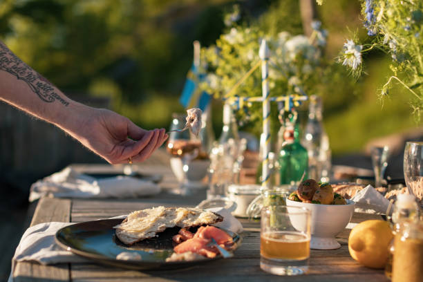 istock A man picks a piece of herring with a fork 1234528402