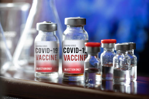 Vaccine and syringe injection.
