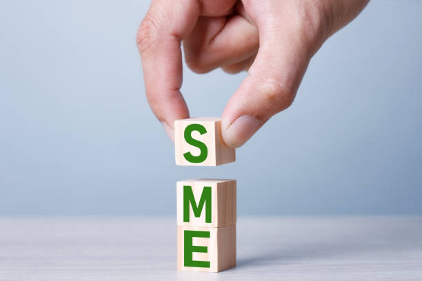 istock Busiiness Concept SME Stack of wooden blocks with letters, Small and Medium Enterprise, 1234585922