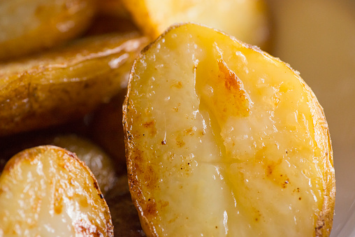 Baked fried roast potato with golden crust