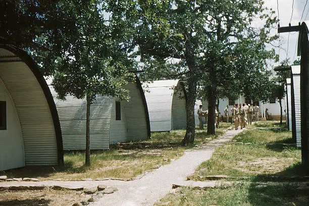 WWII quonset huts at Randolph Field, San Antonio, Texas. 1949. Kodachrome scanned film with grain.