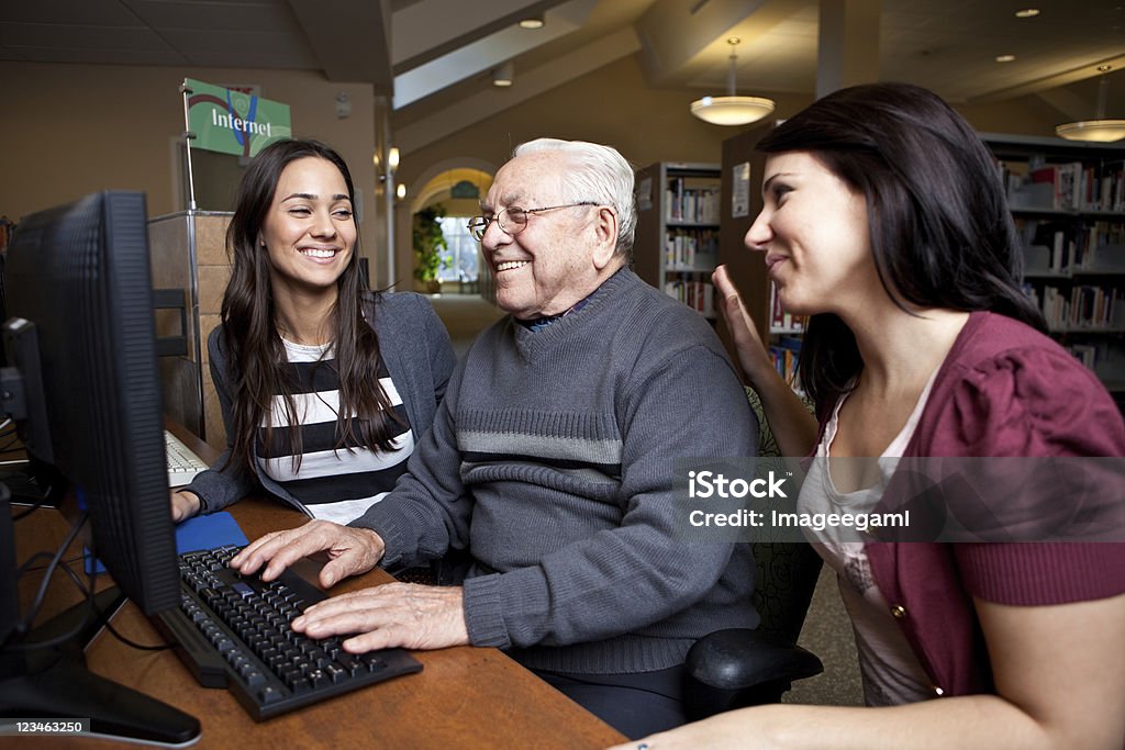Teaching grandpa how to surf the net Please visit my LIGHTBOX CONTAINING THIS SHOOT ONLY: Library Stock Photo