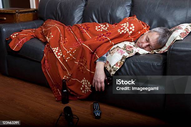 Beer Drinking Couch Potatoe Drunk And Passed Out Stock Photo - Download Image Now - Sleeping, Sofa, Drunk