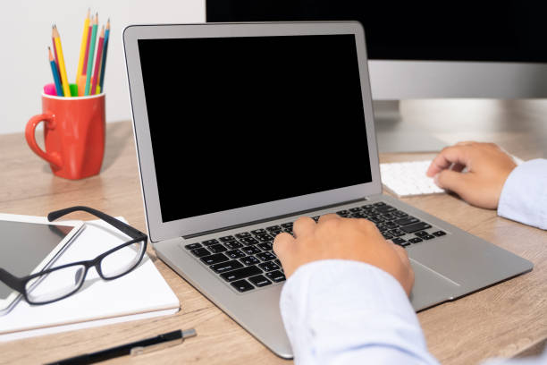 istock Laptop with blank screen on table. Workspace background new project on laptop computer with blank copy space screen for your advertising text message 1234656525