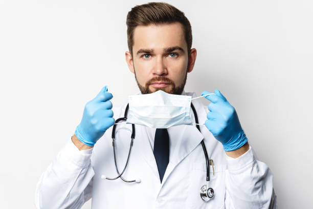 istock Young doctor is wearing prevention mask 1234658070