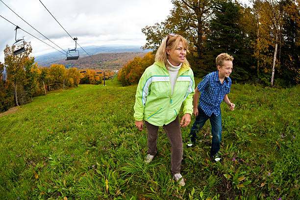 Mother and son hiking on a mountain
