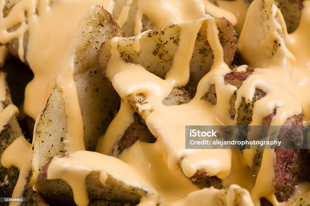 Pommes frites mit Käse - Lizenzfrei Transfettsäure Stock-Foto