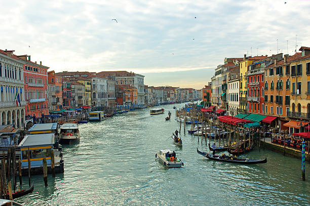 Canal in Venice with gondolas, Italy