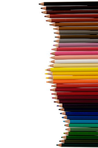 Row of color pencils isolated on white background with Clipping Path.